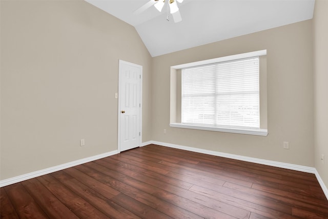 2103 Greenbrier St, Denison, TX 75020 - empty room with a ceiling fan, vaulted ceiling, dark wood finished floors, and baseboards