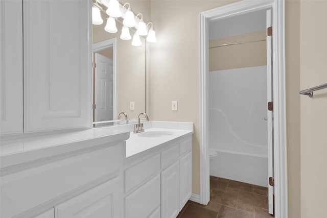 2103 Greenbrier St, Denison, TX 75020 - bathroom featuring vanity, toilet, and tub / shower combination