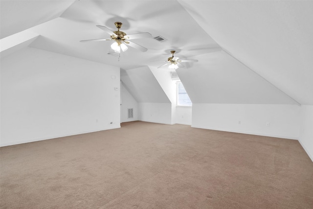 2103 Greenbrier St, Denison, TX 75020 - additional living space with ceiling fan, vaulted ceiling, carpet floors, and baseboards