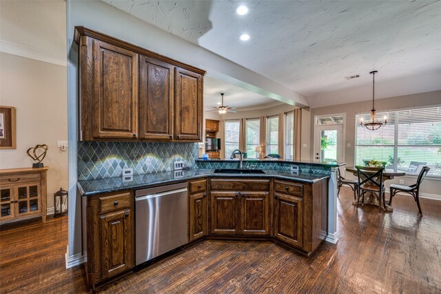 114 Lakehill Dr, Hickory Creek, TX 75065 - kitchen featuring stainless steel dishwasher, a sink, dark wood-style floors, healthy amount of natural light, and ornamental molding