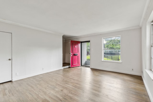 5033 N Hall St, Dallas, TX 75235 - empty room featuring ornamental molding, wood finished floors, and baseboards
