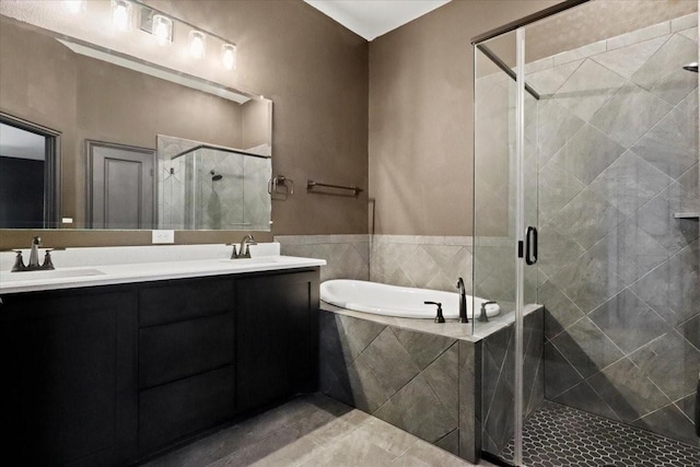 3005 Knoxbridge Rd, Forney, TX 75126 - bathroom with a bath, a shower stall, double vanity, and tile patterned floors