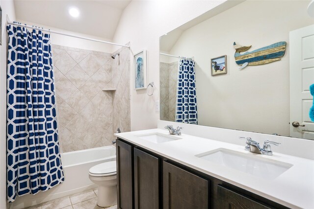 303 Headwater Dr, Fate, TX 75087 - bathroom with toilet, tile patterned floors, shower / bathtub combination with curtain, and double vanity