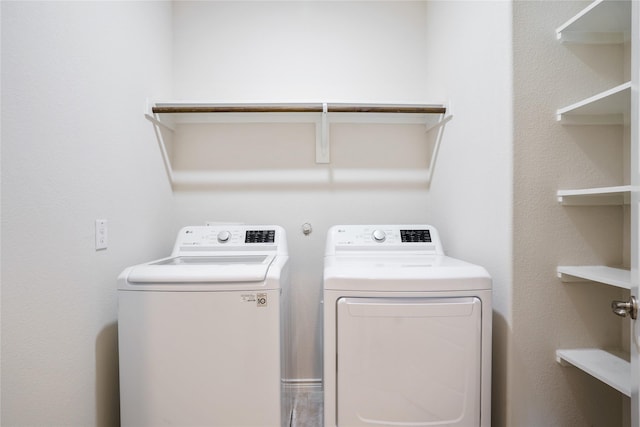 303 Headwater Dr, Fate, TX 75087 - laundry room featuring washing machine and dryer