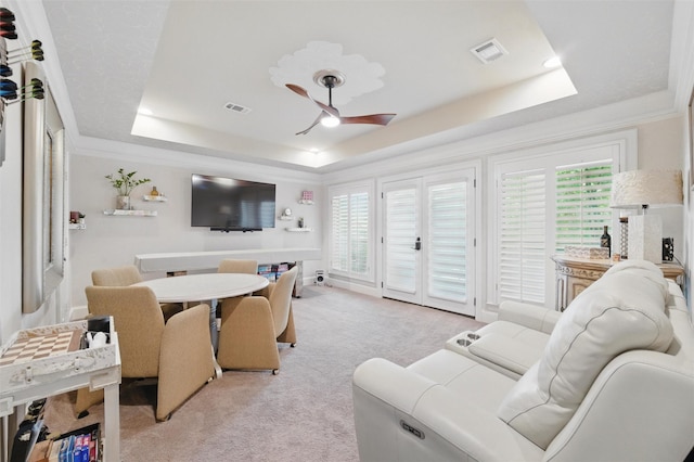 100 Country Club Dr, Heath, TX 75032 - living area featuring a tray ceiling, ceiling fan, light carpet, and crown molding
