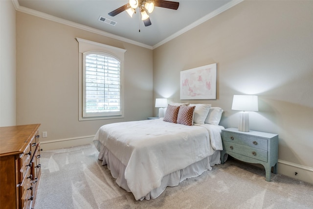 bedroom with light colored carpet, crown molding, a ceiling fan, and baseboards