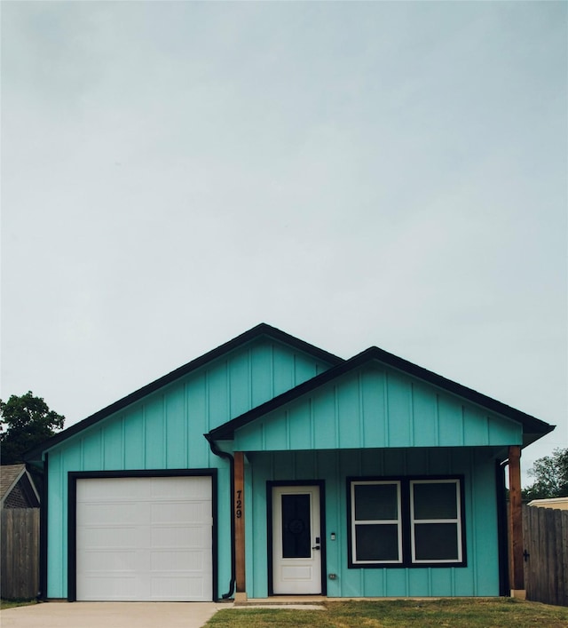 729 E Sears St, Denison, TX 75021 - view of front of property with driveway, fence, and an attached garage