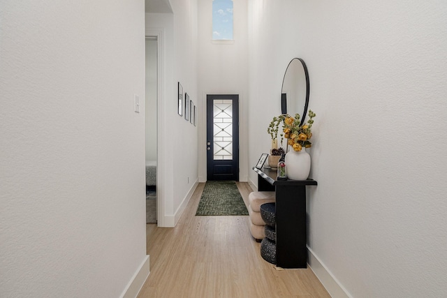 627 Brockwell Bnd, Forney, TX 75126 - foyer with light wood-style flooring and baseboards