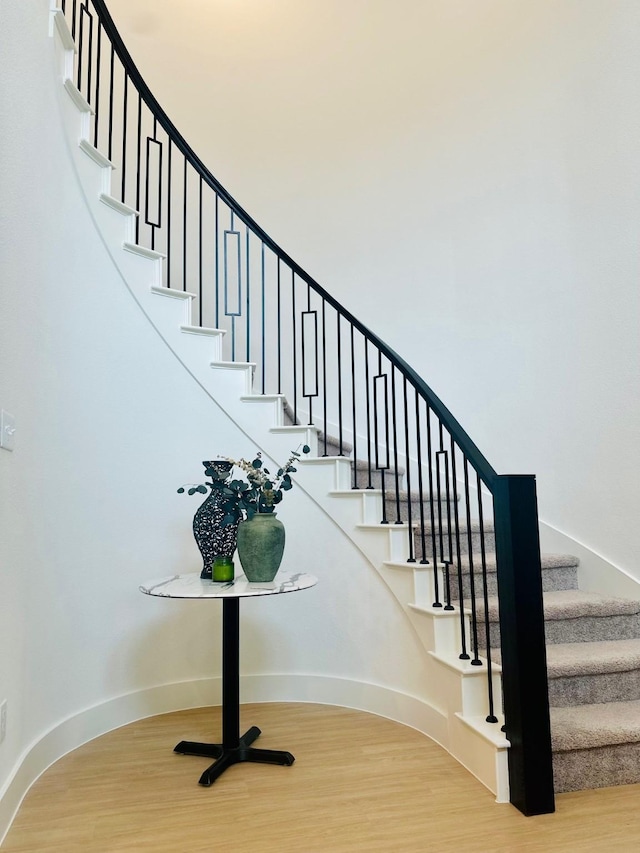 627 Brockwell Bnd, Forney, TX 75126 - stairs with wood finished floors and baseboards