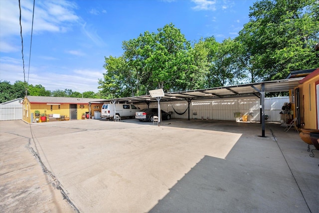 1017 S Newark Ave, Fort Worth, TX 76105 - covered parking lot with fence