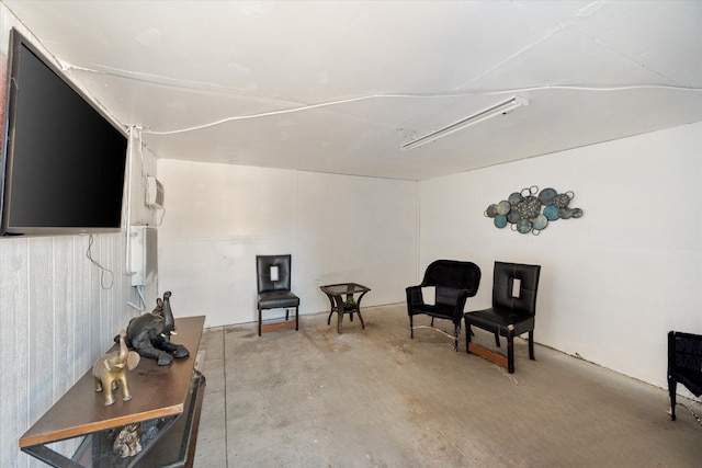 1017 S Newark Ave, Fort Worth, TX 76105 - sitting room with unfinished concrete floors