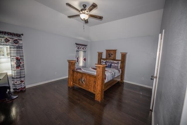 107 Harvest Way, Crandall, TX 75114 - bedroom with dark wood-style flooring, baseboards, and a ceiling fan