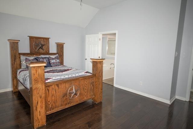 107 Harvest Way, Crandall, TX 75114 - bedroom with vaulted ceiling, dark wood-style flooring, baseboards, and connected bathroom