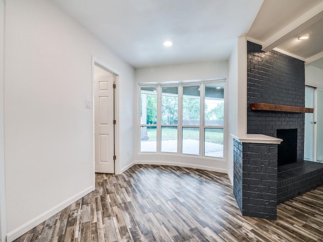 3906 Westview Dr, Rowlett, TX 75088 - unfurnished living room with baseboards, wood finished floors, a fireplace, and recessed lighting