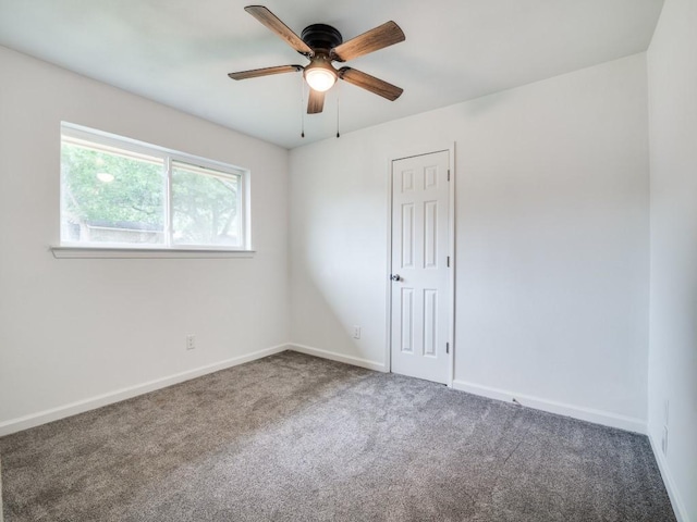 3906 Westview Dr, Rowlett, TX 75088 - carpeted spare room with a ceiling fan and baseboards