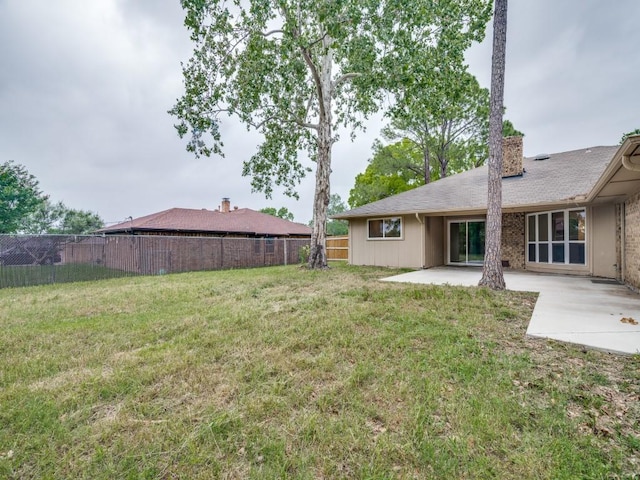 3906 Westview Dr, Rowlett, TX 75088 - view of yard featuring a patio area