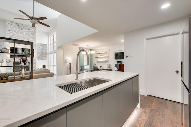 13156 Burninglog Ln, Dallas, TX 75243 - kitchen featuring open floor plan, a sink, ceiling fan, dark wood-style flooring, and recessed lighting