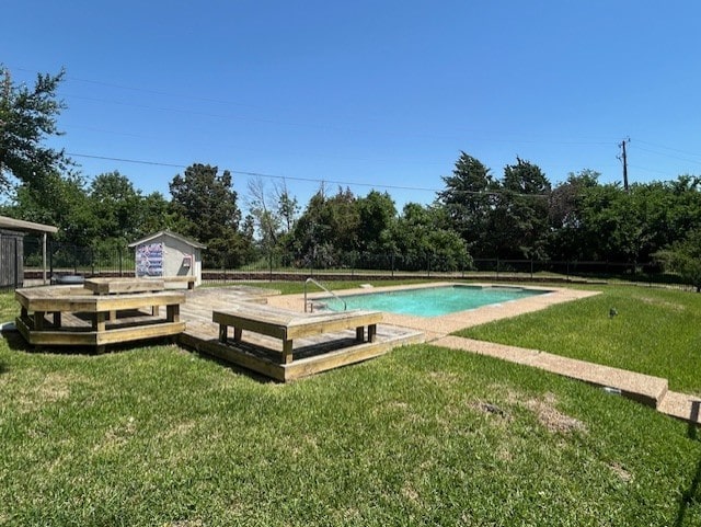 13156 Burninglog Ln, Dallas, TX 75243 - view of pool with a lawn and view of wooded area