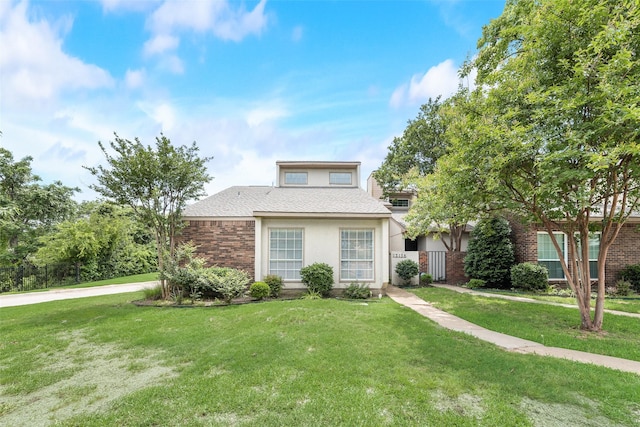 13156 Burninglog Ln, Dallas, TX 75243 - view of front facade with stucco siding