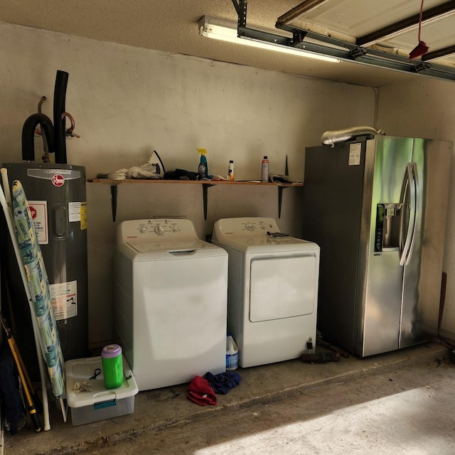 611 N Lamar St, Tioga, TX 76271 - laundry area featuring washer and dryer, water heater, and a garage