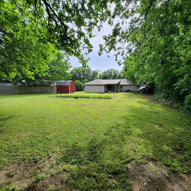 611 N Lamar St, Tioga, TX 76271 - view of yard featuring a shed and an outdoor structure