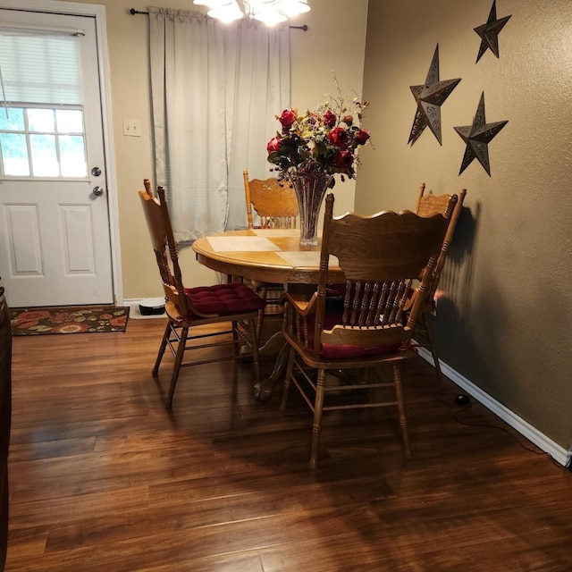 611 N Lamar St, Tioga, TX 76271 - dining space with wood finished floors and baseboards
