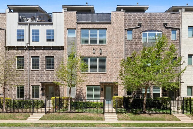 3928 Riesling Rdg, Dallas, TX 75204 - multi unit property with brick siding and a fenced front yard