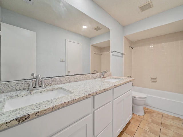 3920 Saint Christopher Ln, Dallas, TX 75287 - full bath with toilet, bathtub / shower combination, tile patterned floors, double vanity, and recessed lighting