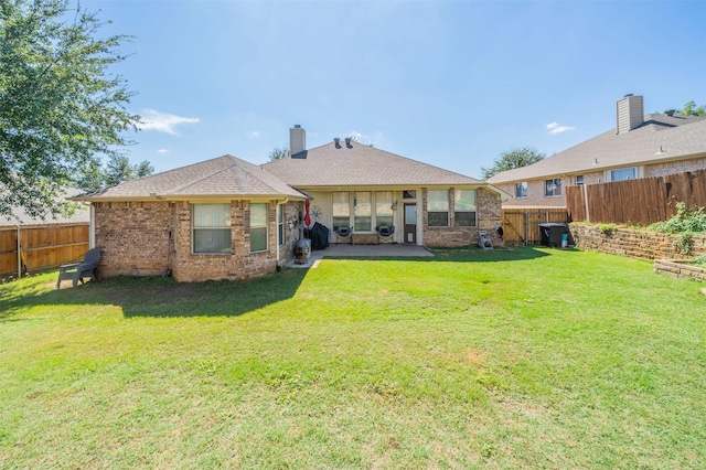 2113 Old Foundry Rd, Weatherford, TX 76087 - back of house with brick siding and a patio