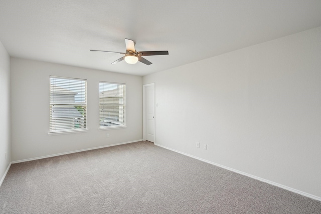 12350 Orloff Dr, Rhome, TX 76078 - spare room with a ceiling fan, baseboards, and carpet flooring