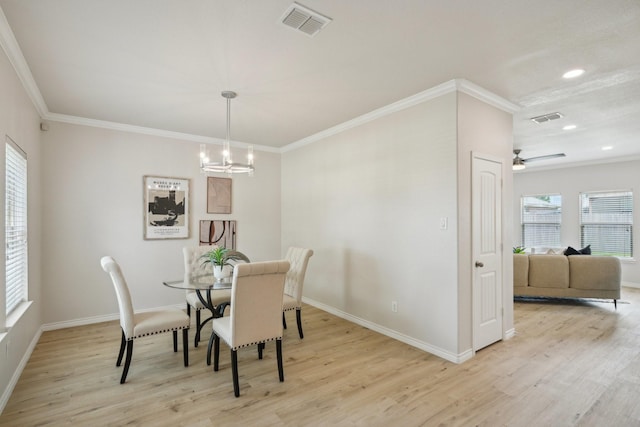 12350 Orloff Dr, Rhome, TX 76078 - dining space featuring plenty of natural light, light wood-style floors, crown molding, baseboards, and a ceiling fan