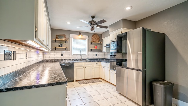 8147 Fawn Cir, Granbury, TX 76049 - kitchen with black dishwasher, freestanding refrigerator, open shelves, a sink, and tasteful backsplash