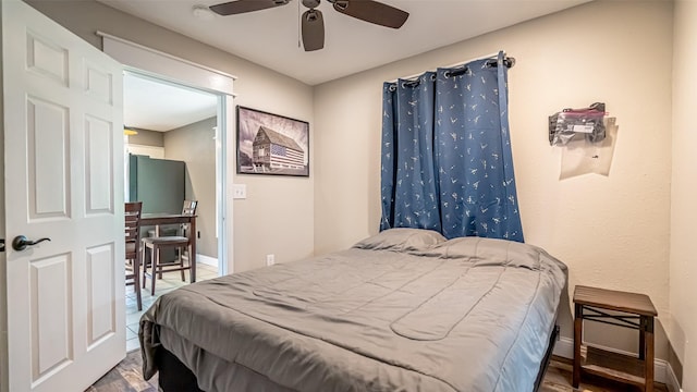 8147 Fawn Cir, Granbury, TX 76049 - bedroom featuring baseboards and a ceiling fan