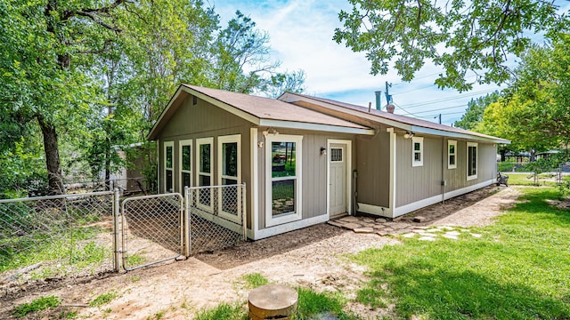 8147 Fawn Cir, Granbury, TX 76049 - rear view of property with a gate