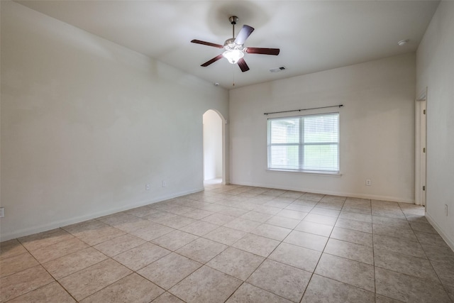 4601 Shy Creek Ln, Denton, TX 76207 - tiled spare room featuring arched walkways and ceiling fan