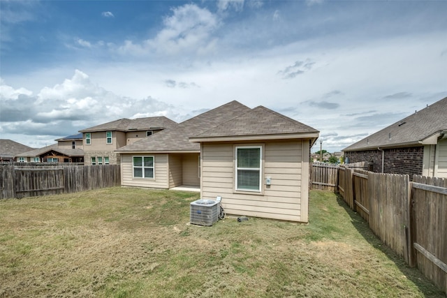4601 Shy Creek Ln, Denton, TX 76207 - rear view of house featuring a fenced backyard and roof with shingles