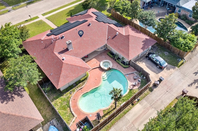 drone / aerial view of a pool area