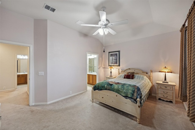 7552 Angel Trace Dr, Frisco, TX 75036 - bedroom with light colored carpet, baseboards, ensuite bathroom, vaulted ceiling, and a ceiling fan