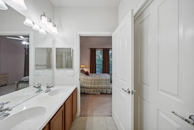 7552 Angel Trace Dr, Frisco, TX 75036 - bathroom featuring connected bathroom, tile patterned flooring, double vanity, and ceiling fan