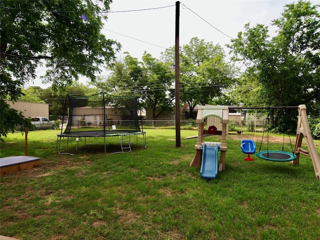 804 Austin Rd, Graham, TX 76450 - view of yard with a trampoline and a playground