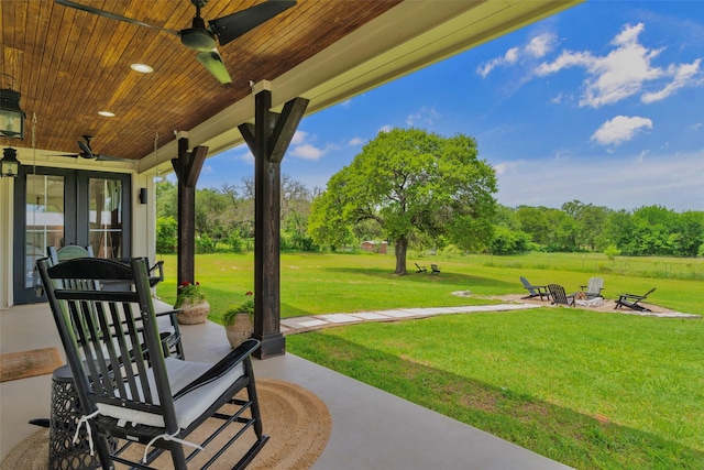 1299 Harmony Cir, Weatherford, TX 76087 - view of patio with an outdoor fire pit and ceiling fan