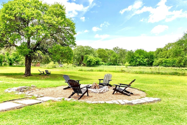 1299 Harmony Cir, Weatherford, TX 76087 - view of yard featuring a fire pit and view of scattered trees