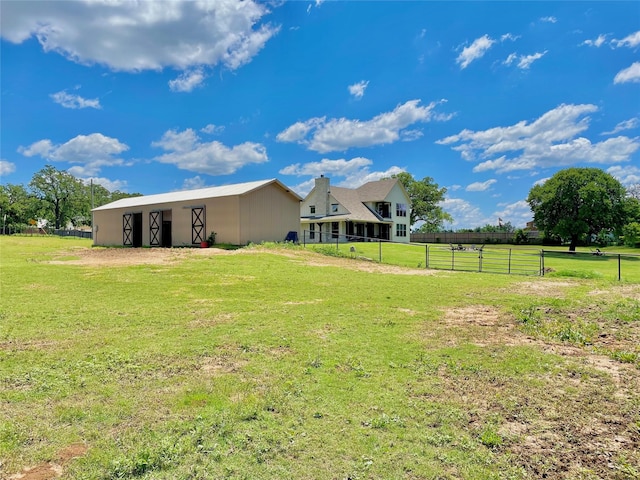 1299 Harmony Cir, Weatherford, TX 76087 - view of yard featuring a pole building and an outbuilding