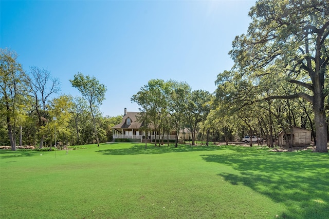 3325 Creek Rd, Keller, TX 76248 - view of home's community with a lawn and view of wooded area