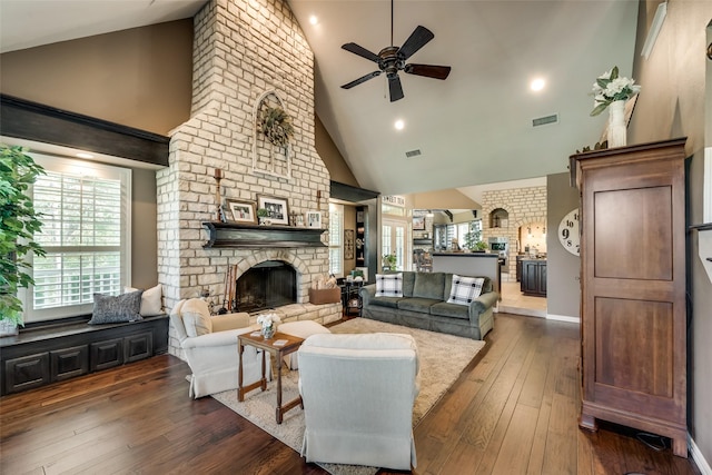 3325 Creek Rd, Keller, TX 76248 - living room with a fireplace, high vaulted ceiling, a ceiling fan, dark wood finished floors, and baseboards