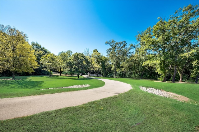 3325 Creek Rd, Keller, TX 76248 - view of community with a lawn and view of wooded area