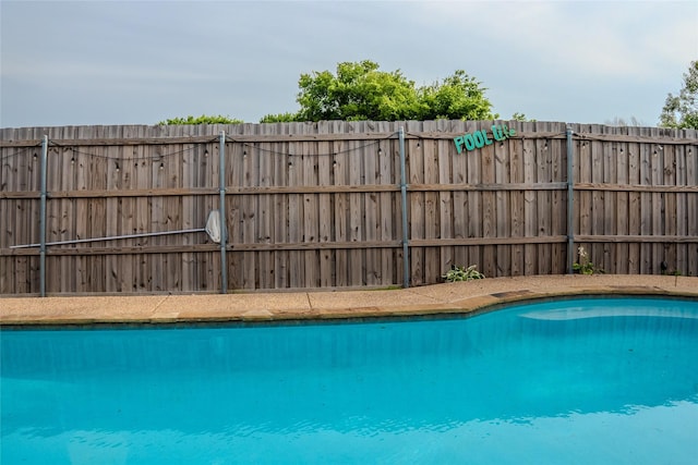 7016 Buttonwood Dr, Fort Worth, TX 76137 - view of swimming pool featuring fence