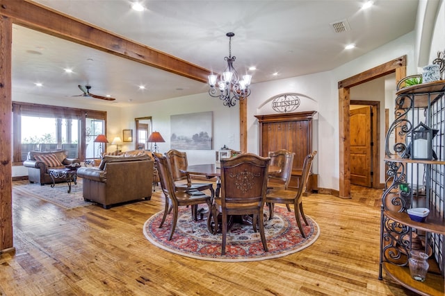 1633 Scenic Dr Unit 201, Graford, TX 76449 - dining area with wood finished floors, a chandelier, recessed lighting, ceiling fan, and baseboards