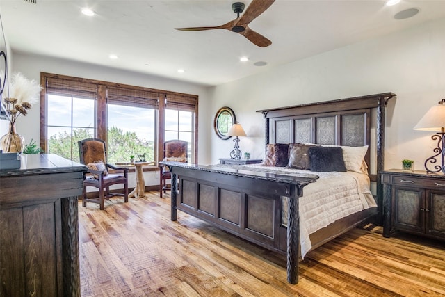 1633 Scenic Dr Unit 201, Graford, TX 76449 - bedroom with light wood finished floors, recessed lighting, and ceiling fan