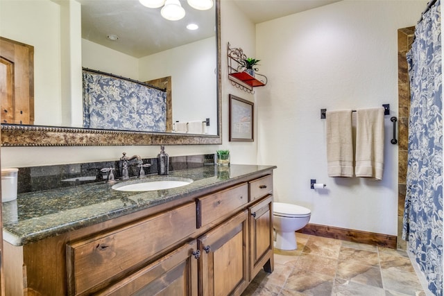 1633 Scenic Dr Unit 201, Graford, TX 76449 - bathroom with vanity, baseboards, toilet, and curtained shower